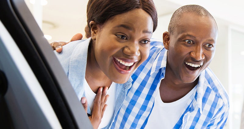 smiling couple Grand Island GMC in GRAND ISLAND NE
